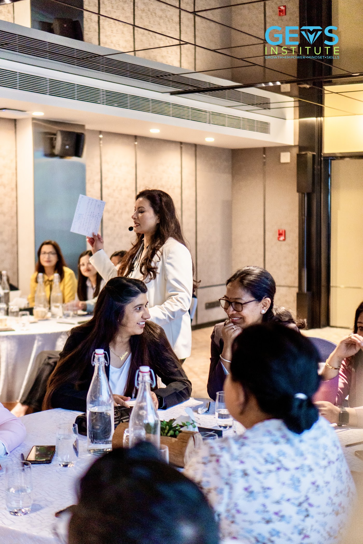 A participant speaking during a GEMS learning session