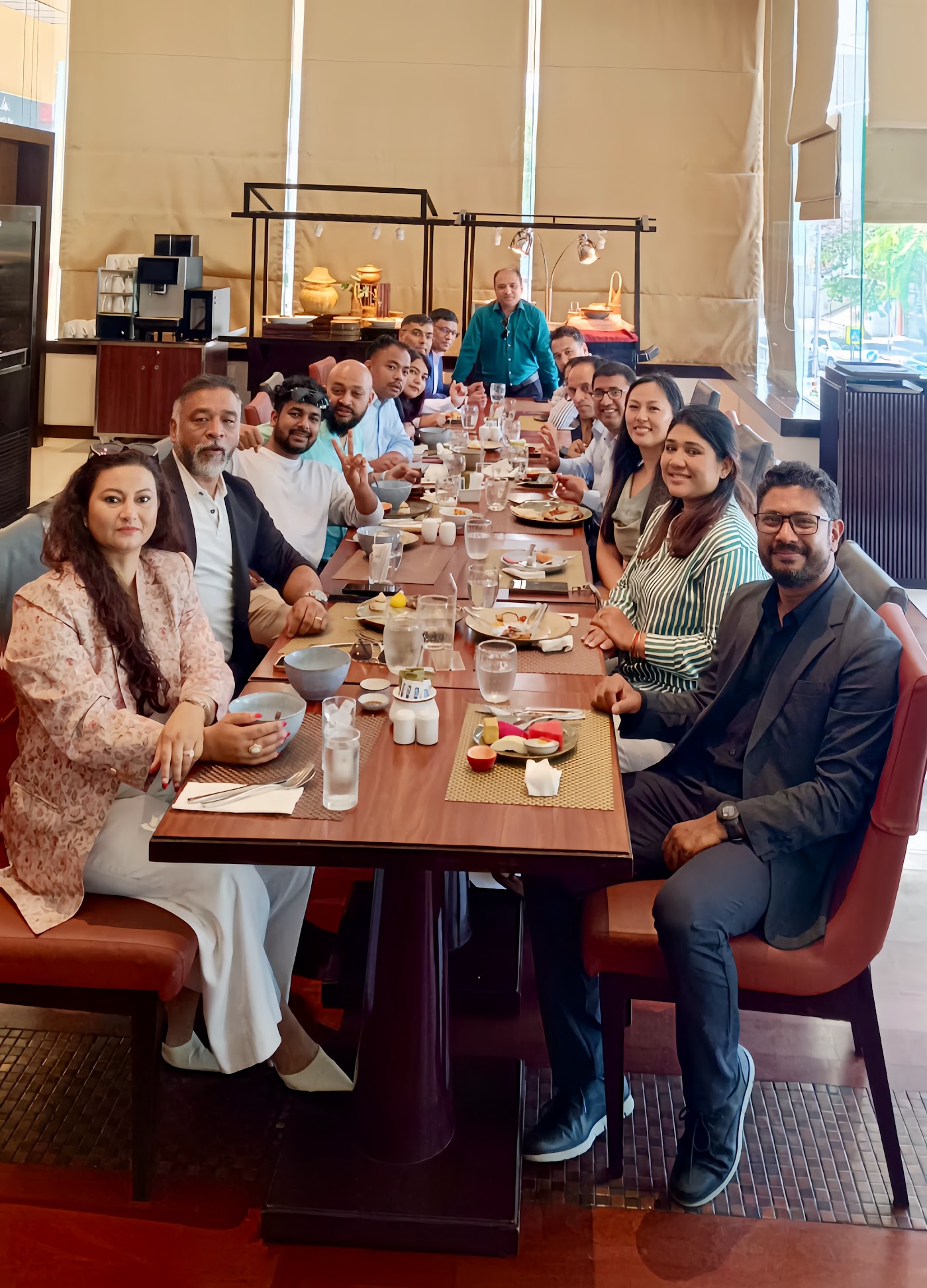 Participants sharing a meal at a GEMS event