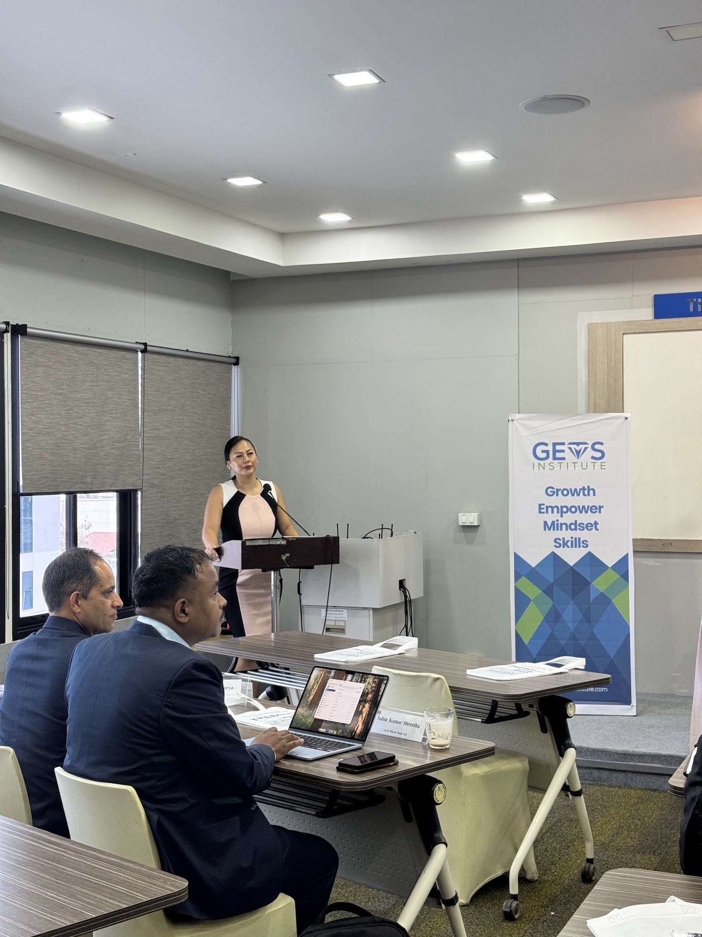 A facilitator leading a GEMS training session