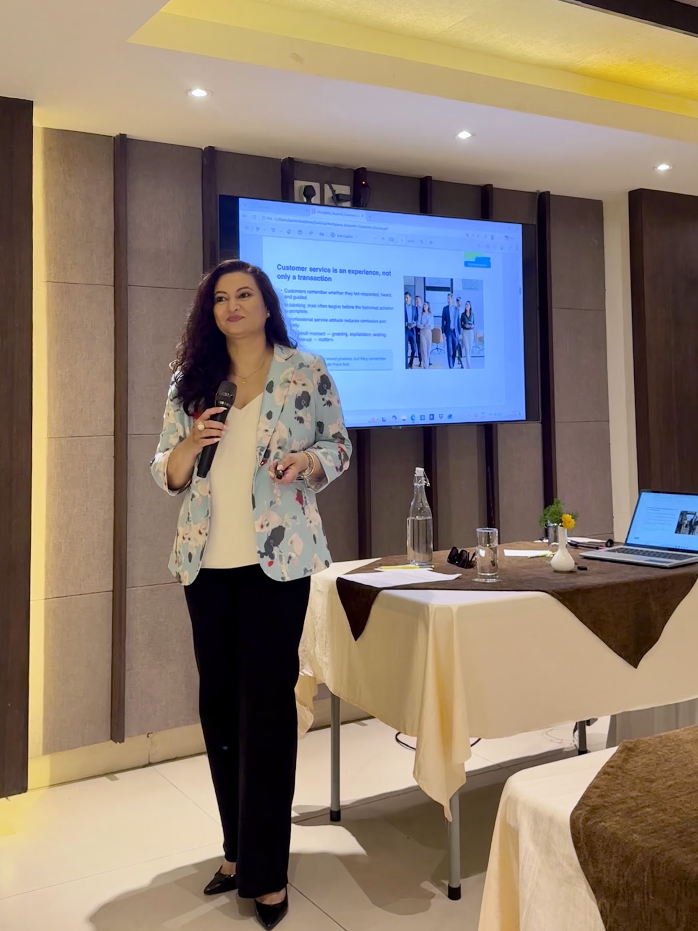 A facilitator leading a GEMS training session