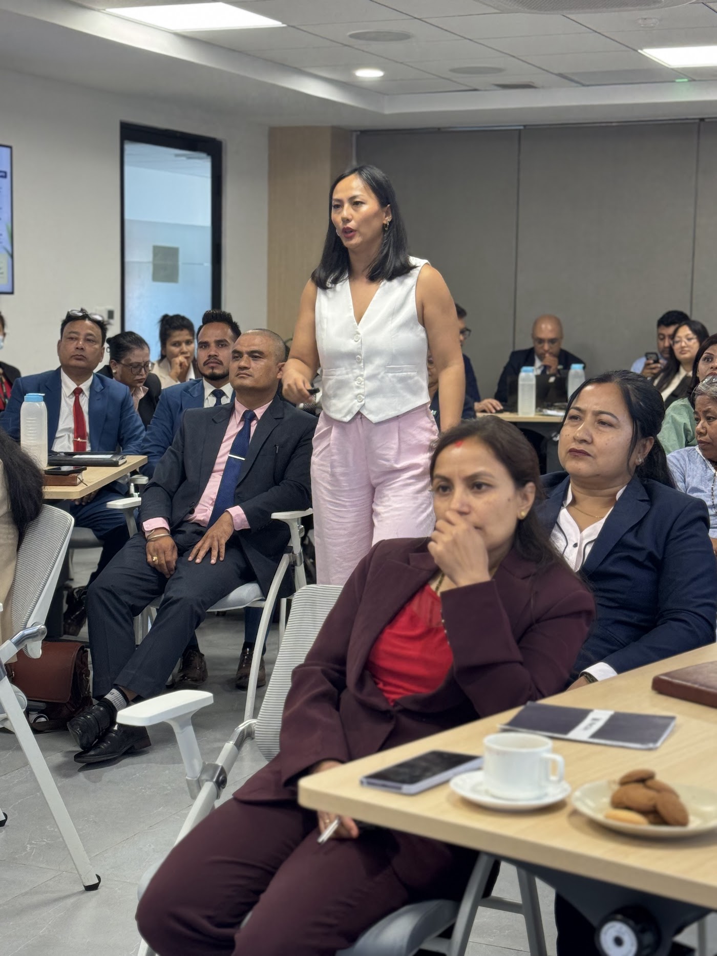 A facilitator leading a GEMS training session